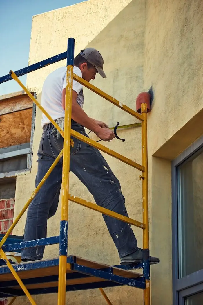 Construction worker on scaffolding