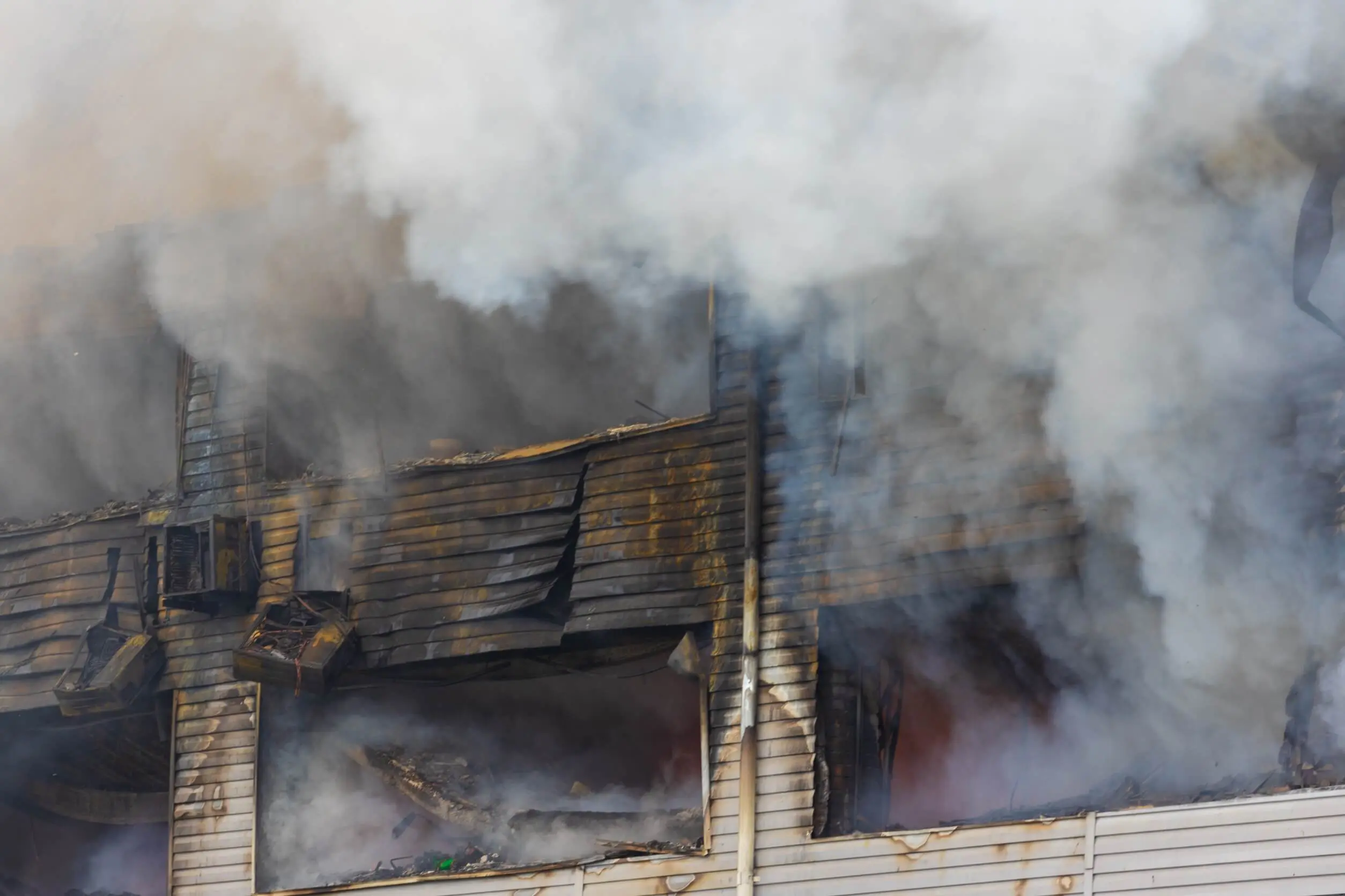 Building engulfed in heavy smoke