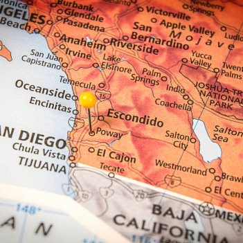 A map highlighting Southern California, with a yellow pin marking Poway